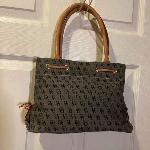 Dooney & Bourke small gray canvas logo tan leather straps and tassels.satchel. - Picture 5 of 12